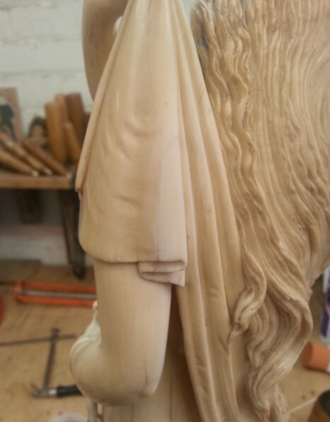 Ivory sculpture - section repair prior to colour matching